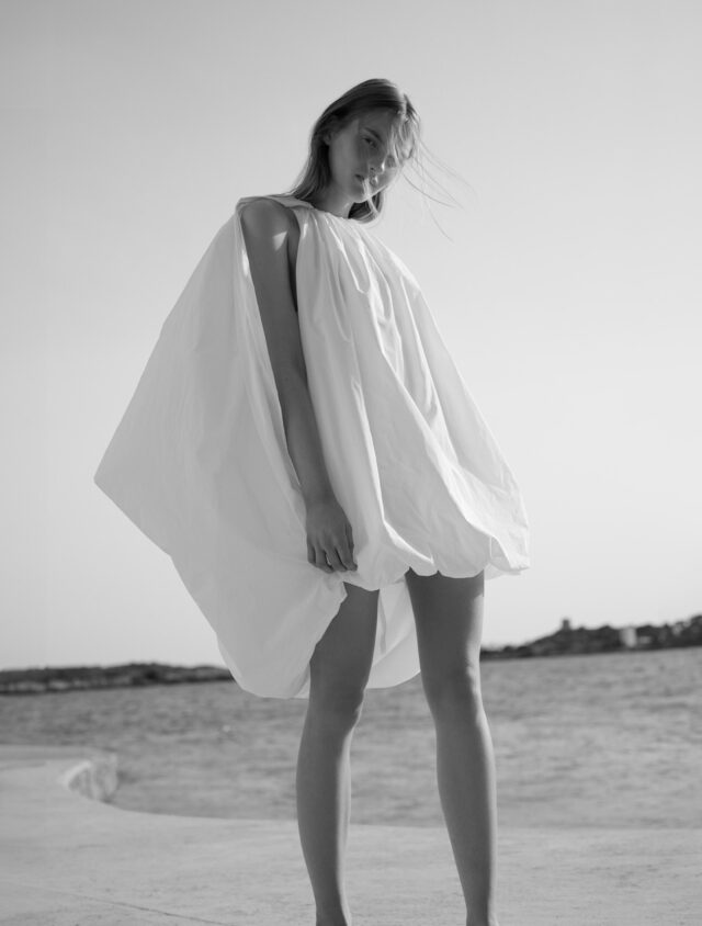 a woman in a white dress
