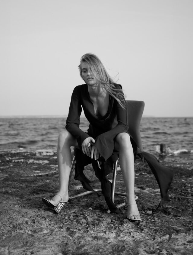 a woman sitting on a chair
