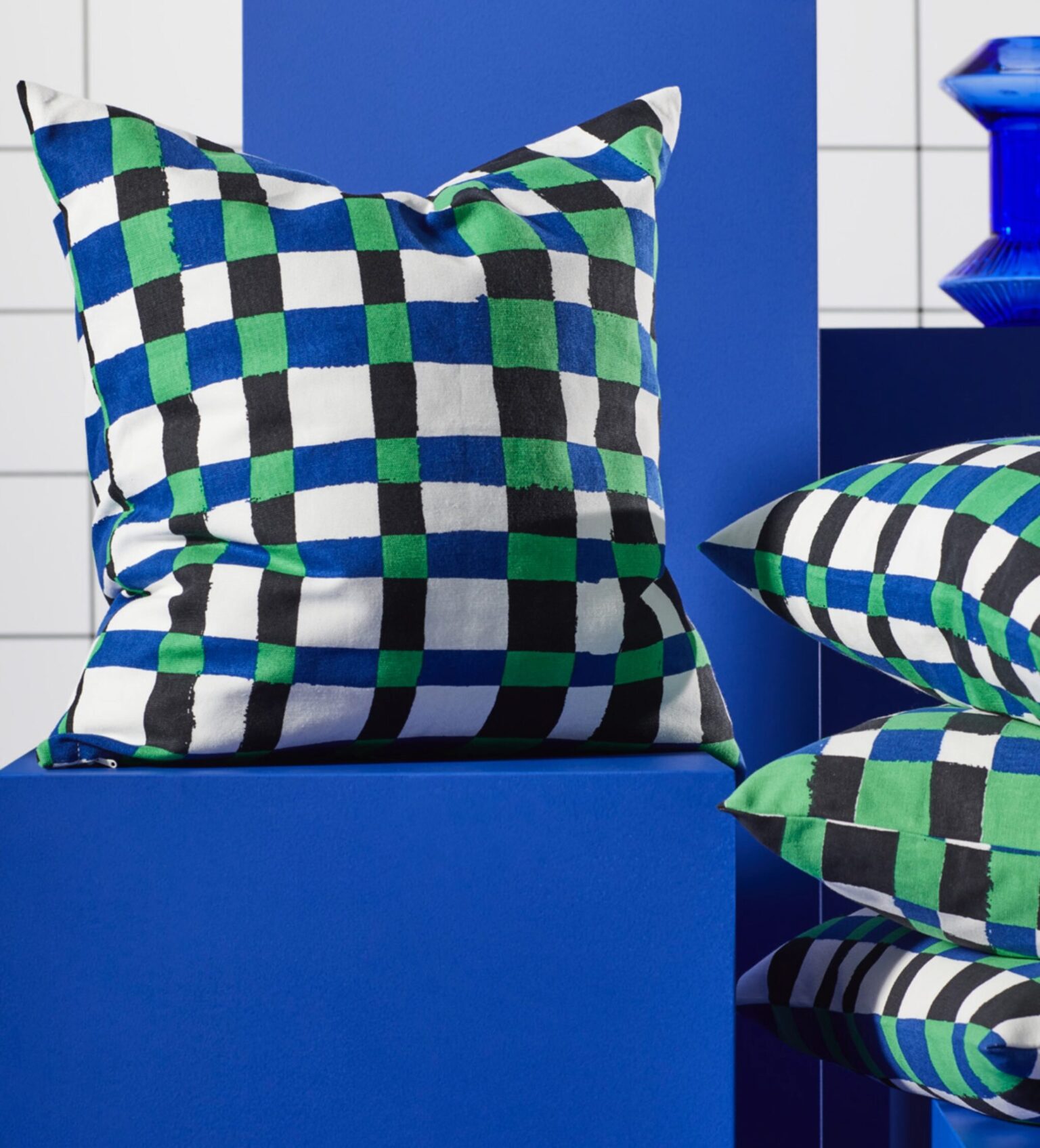 a pillow on a blue surface