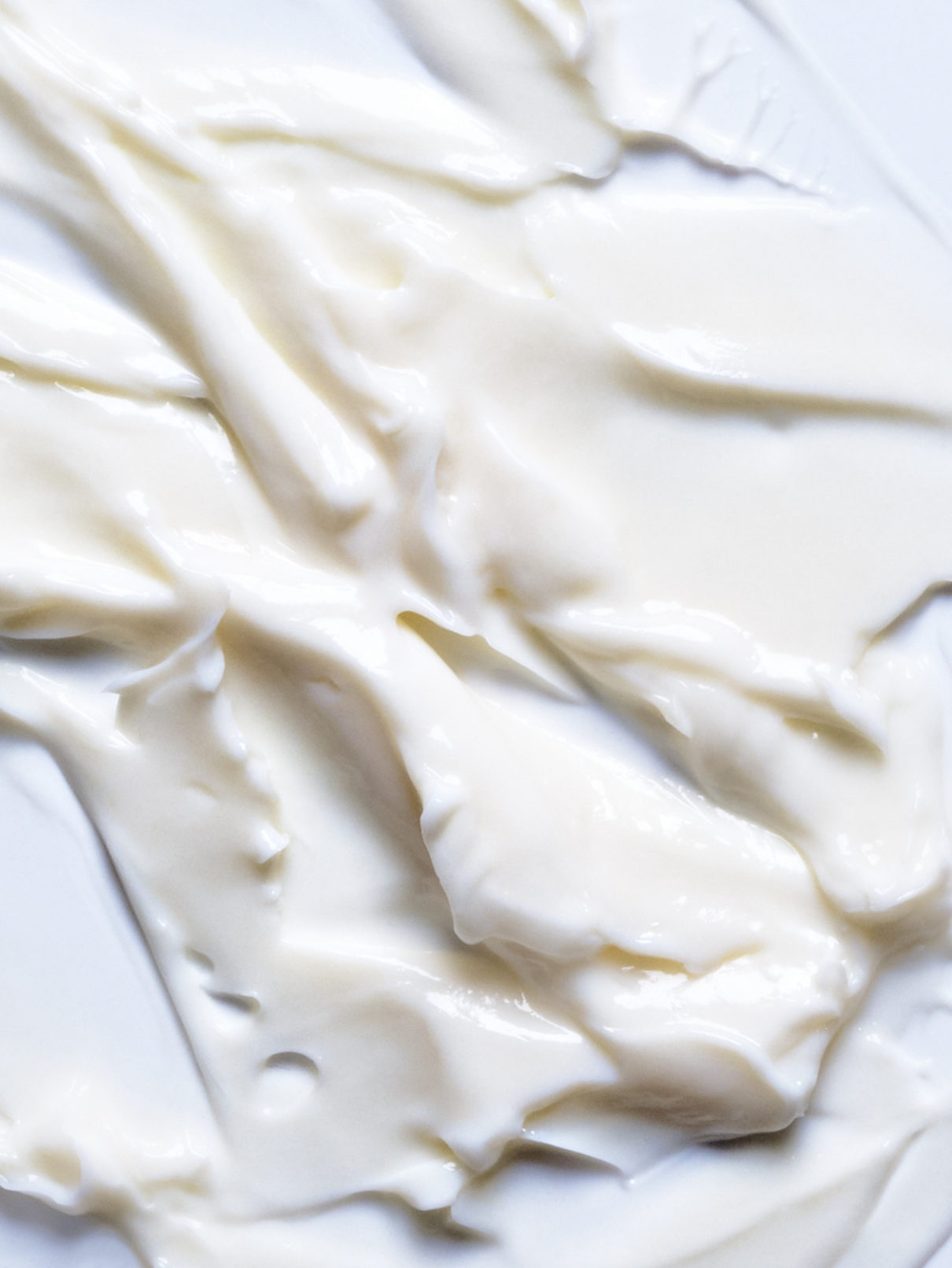a close up of a white cream