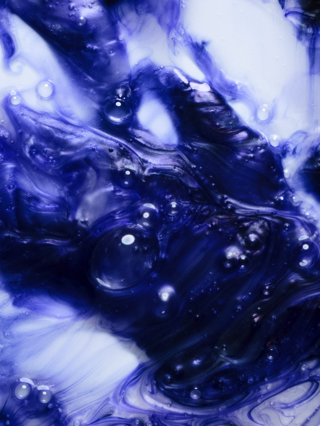 a close up of a blue liquid
