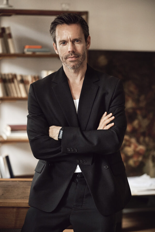 a man in a black suit