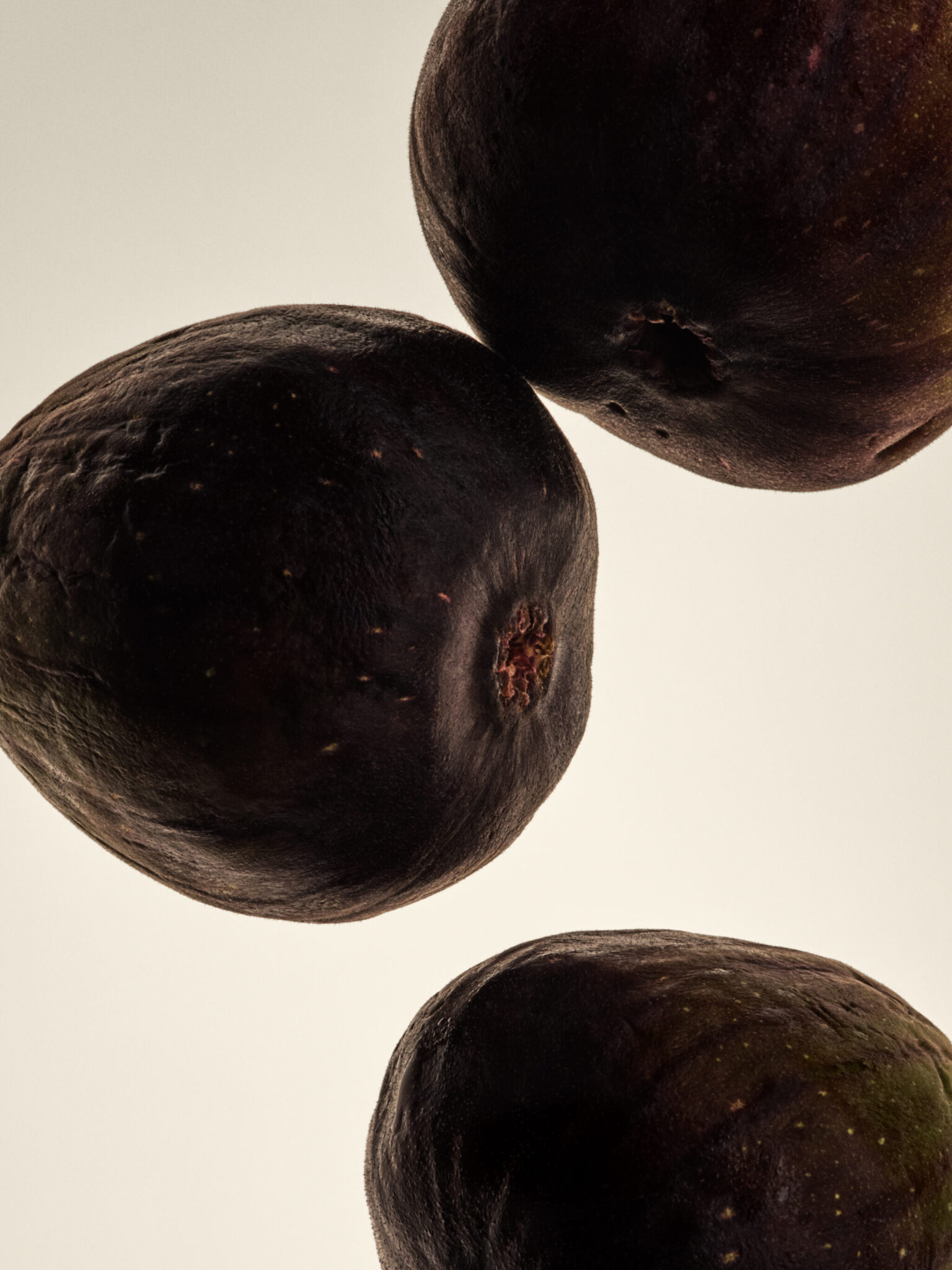 a group of black fruit