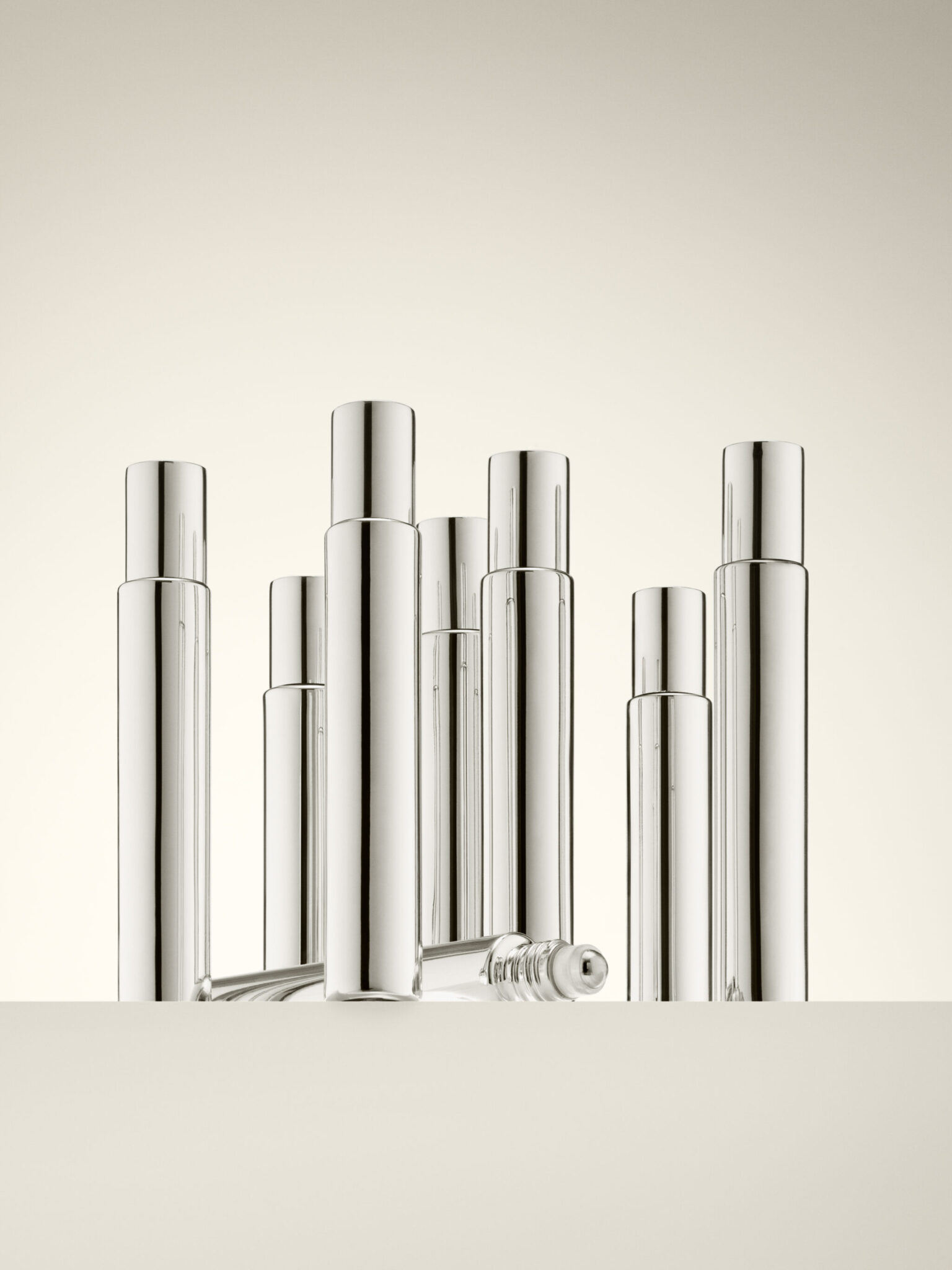 a group of silver bottles