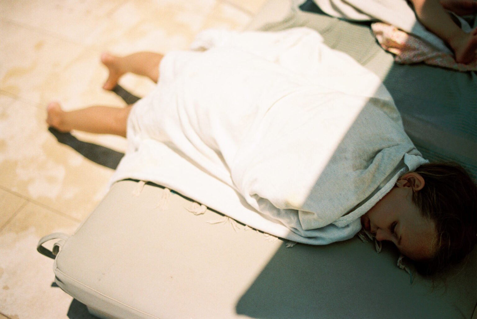 a person lying on a couch