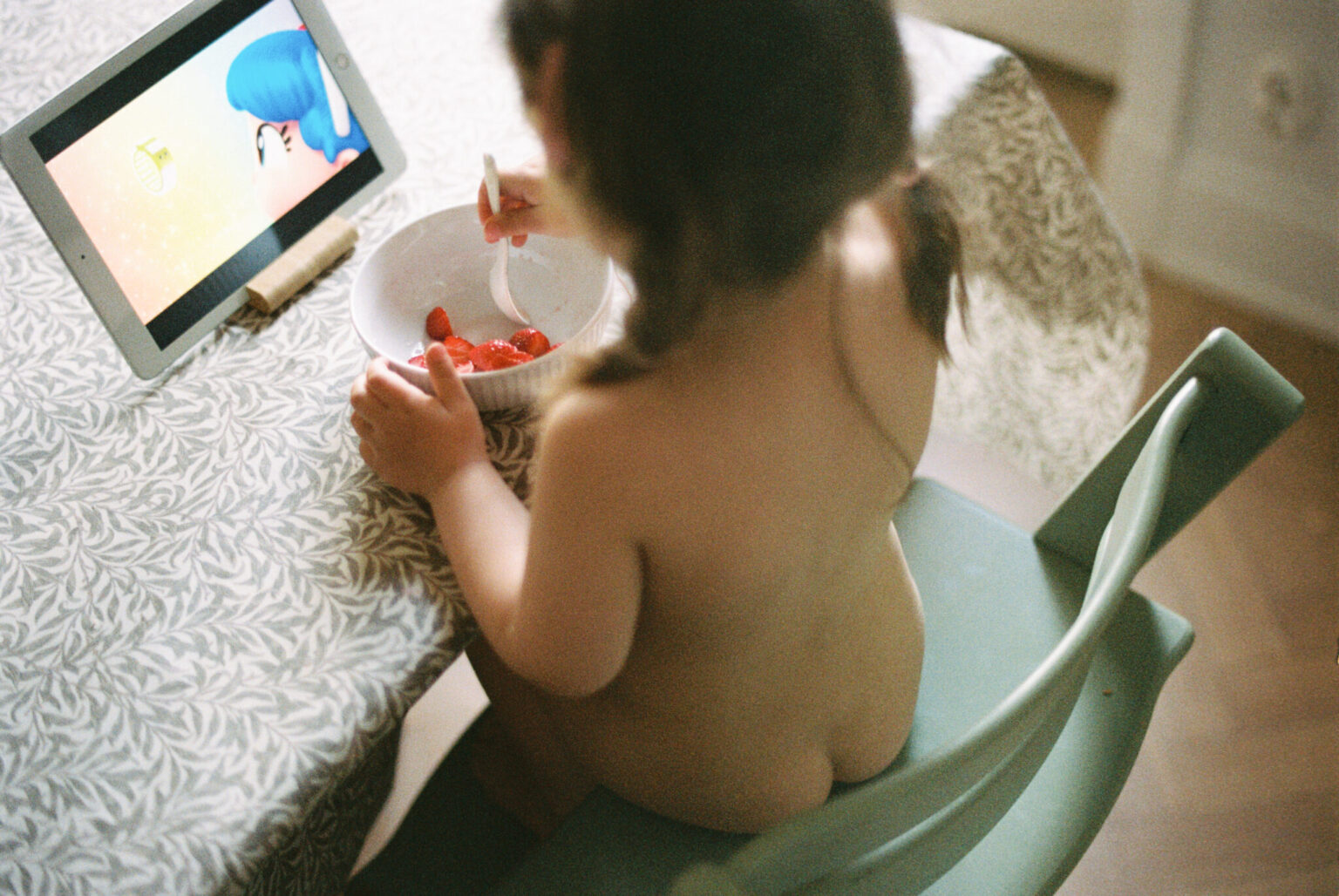 a child eating from a bowl