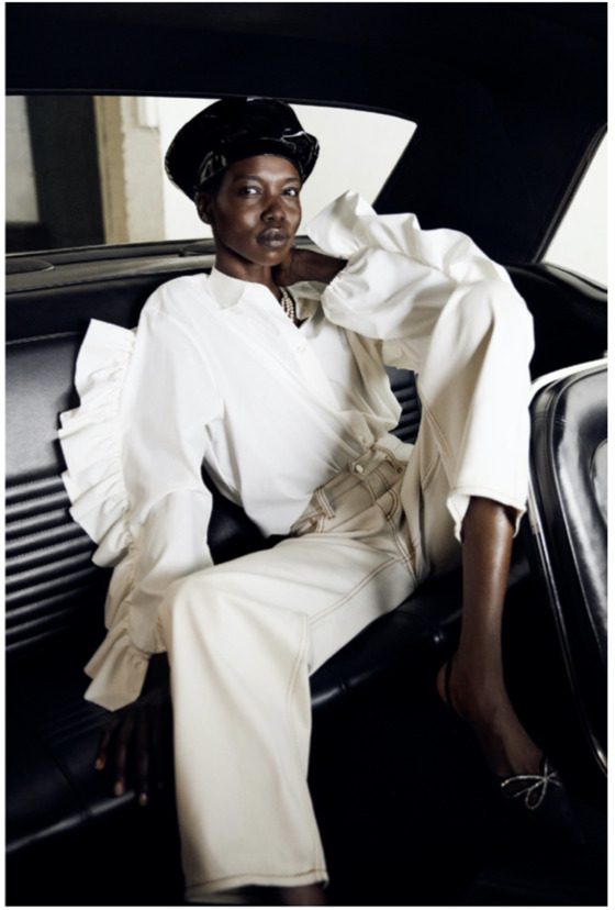 a woman sitting in a car