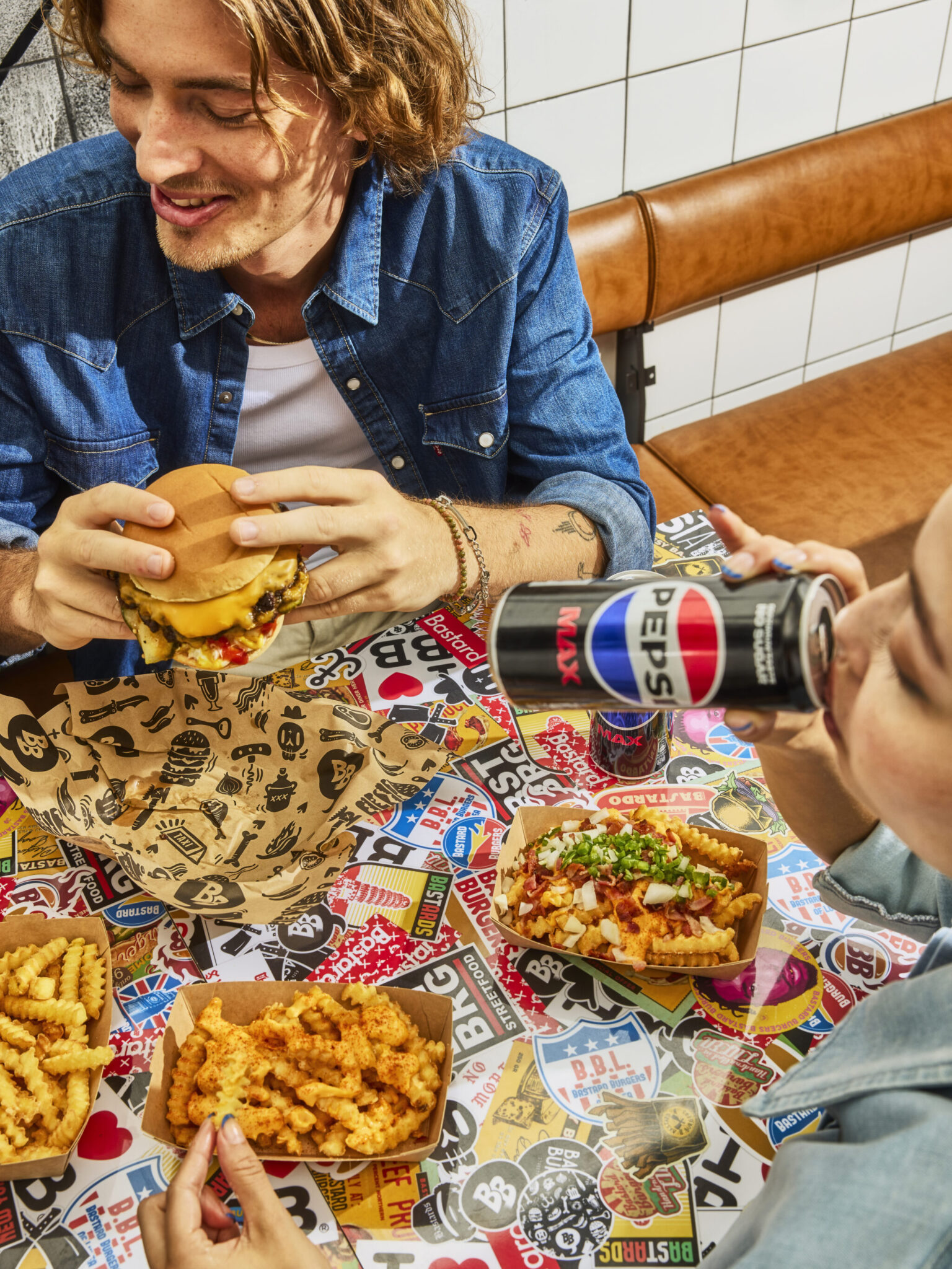 a man and woman eating at a table