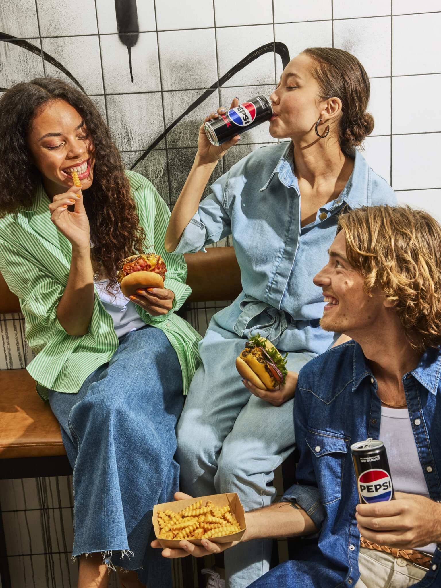 a group of people eating and drinking