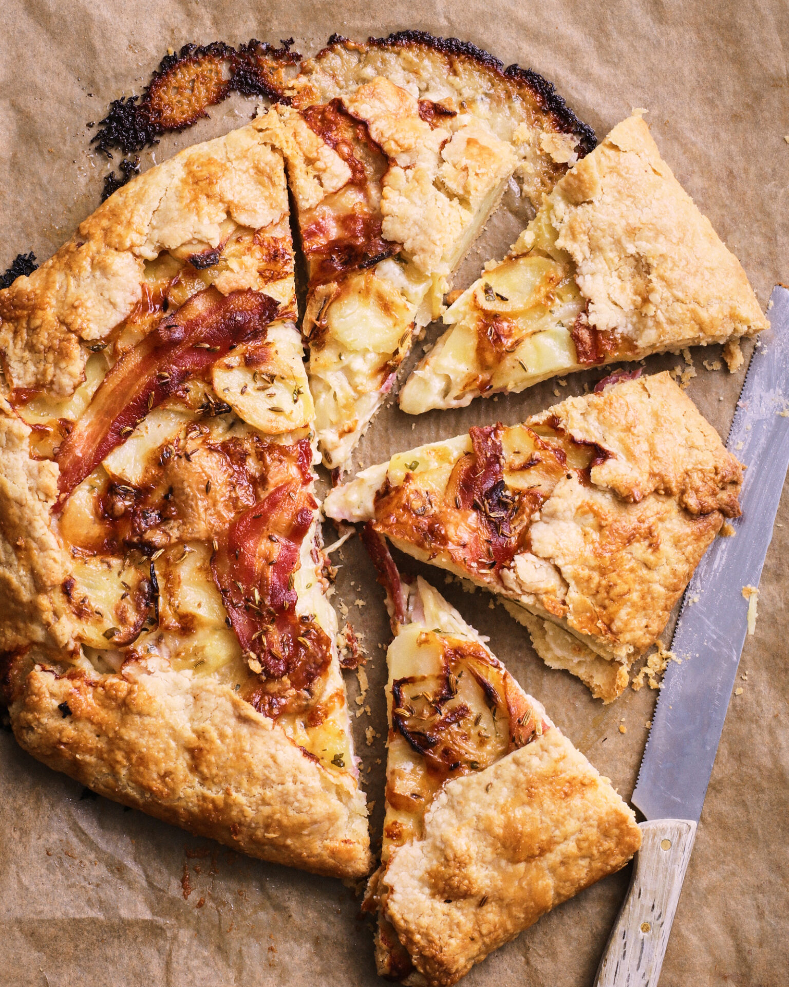 a pie with bacon and cheese