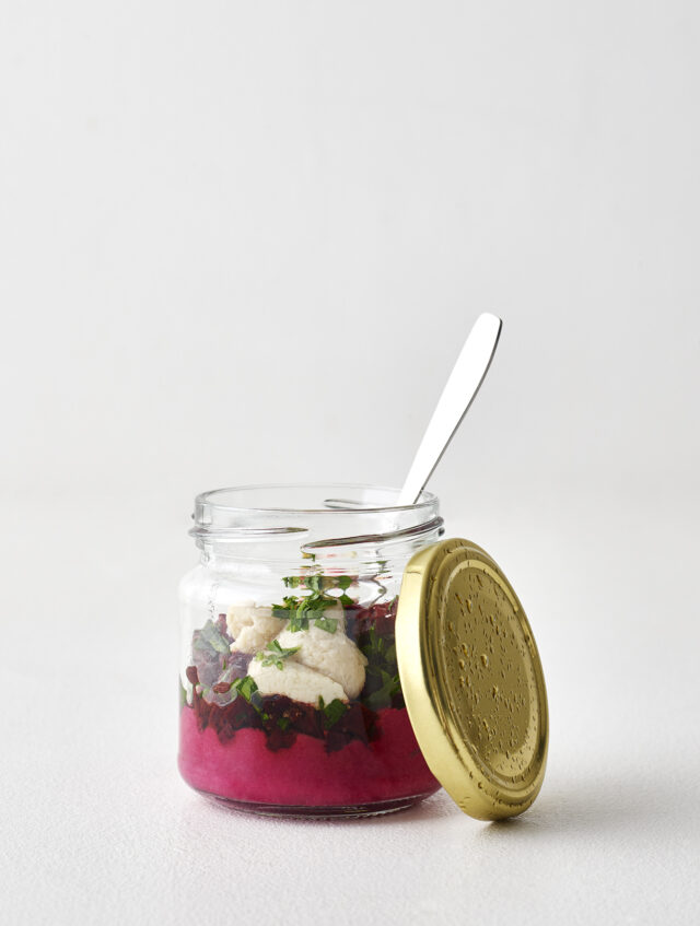 a jar of food with a spoon