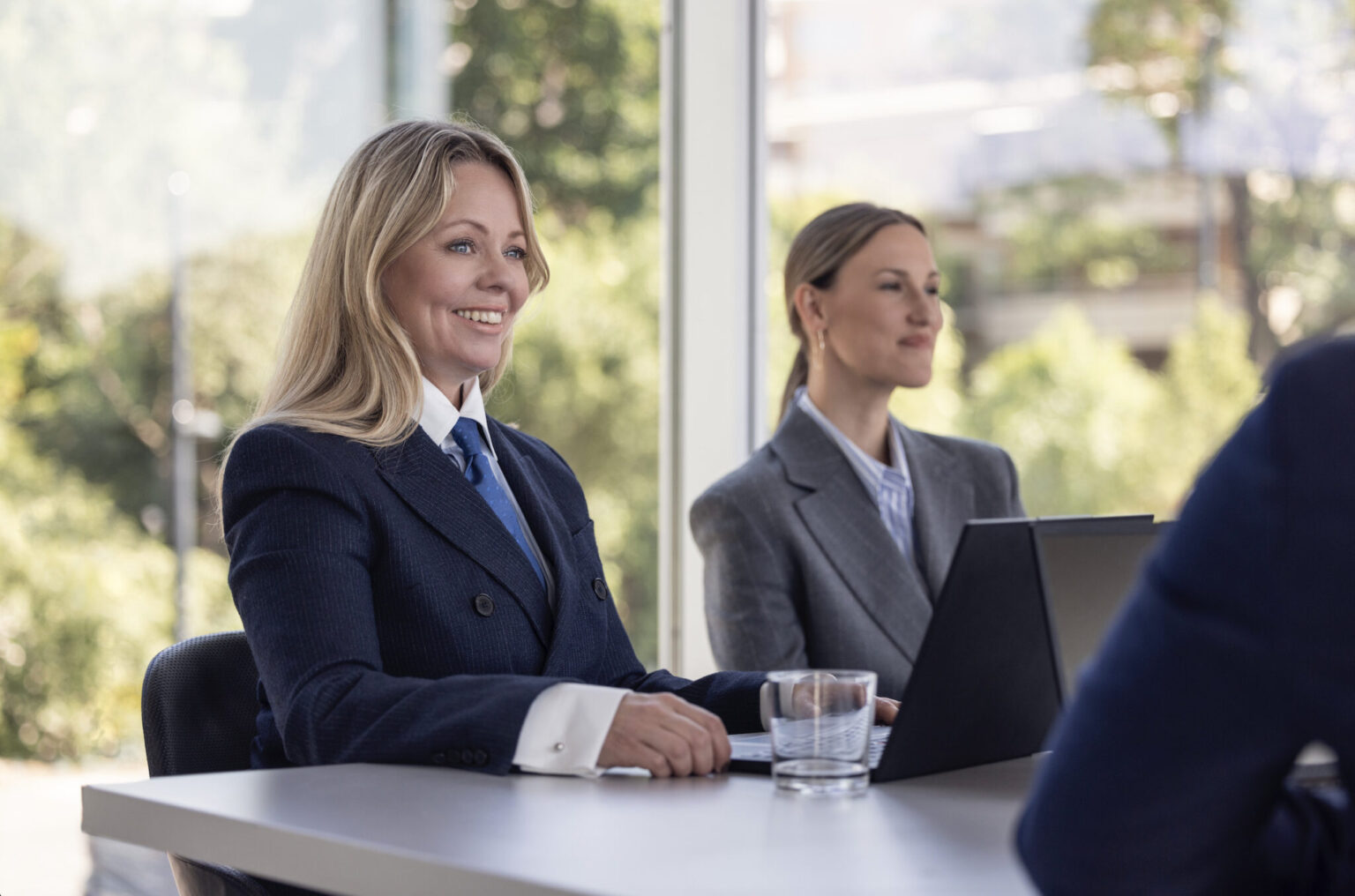 a group of people sitting at a table