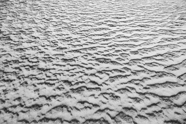 a close-up of a sand surface