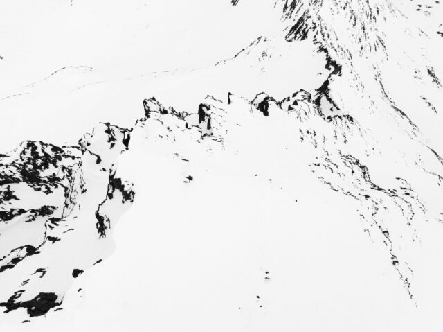 a snowy mountain with snow on it