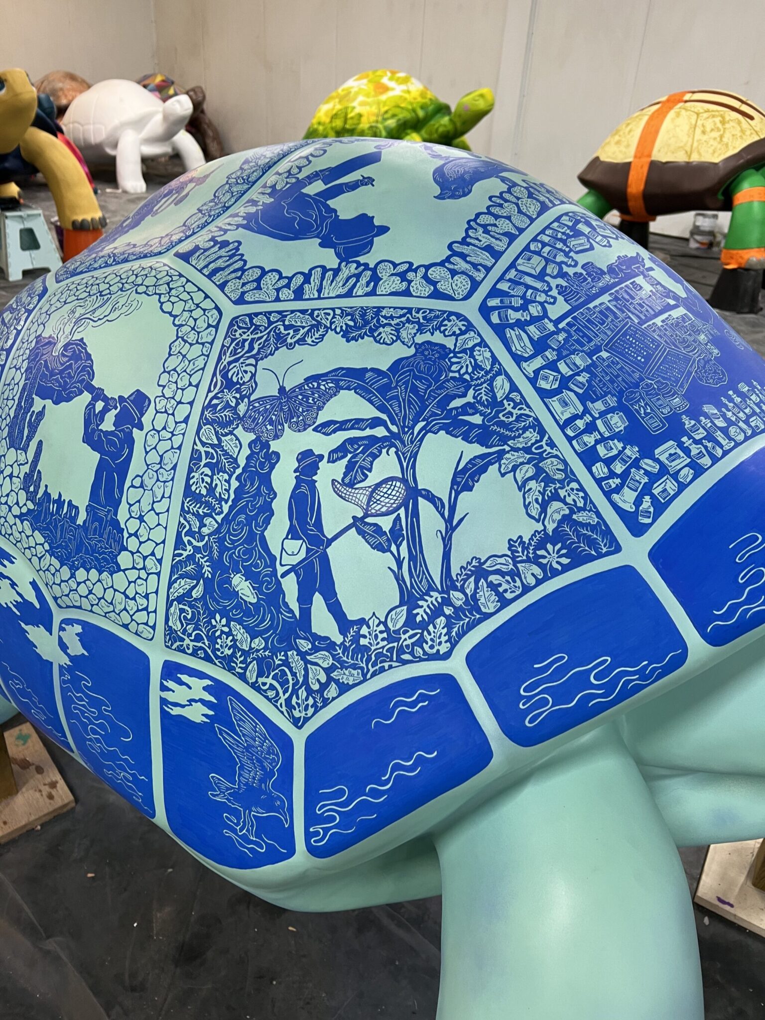 a blue and white painted turtle