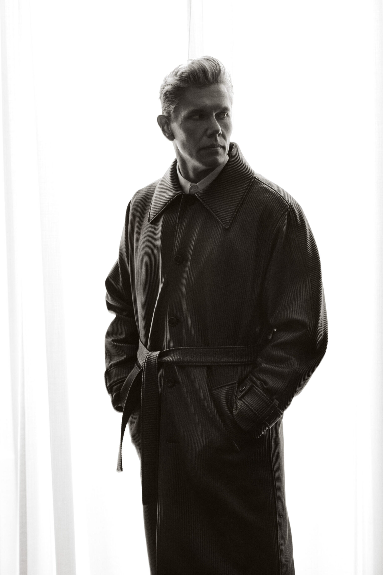 a man in a trench coat