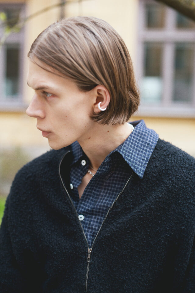 a man with a piercing