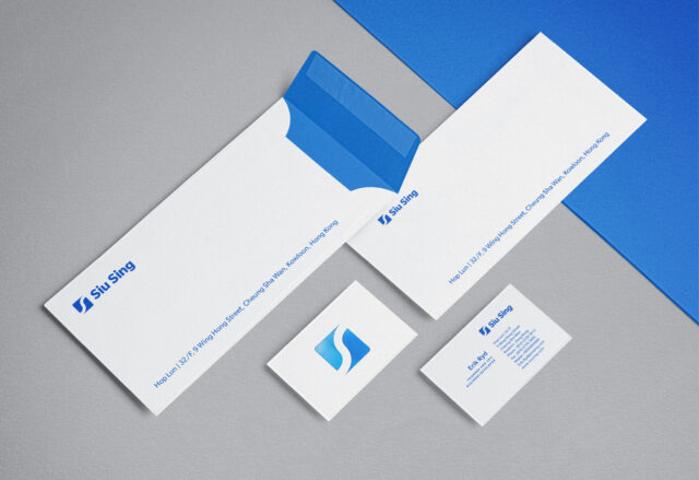 a white envelopes and business cards