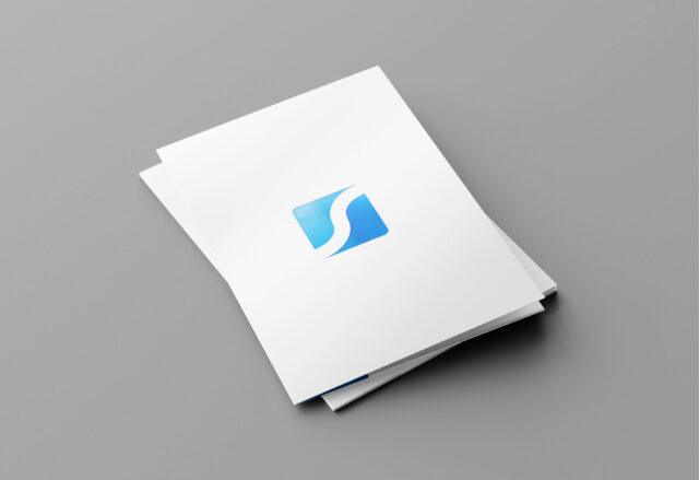 a stack of white paper with blue logo