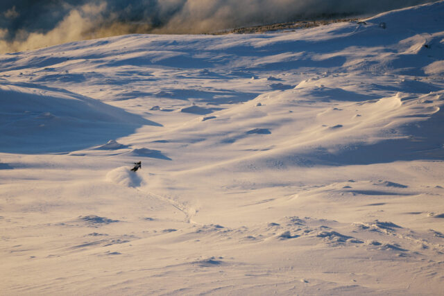 a person on a snowboard
