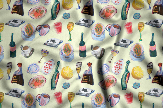 a pattern of drinks and beverages on a white blanket