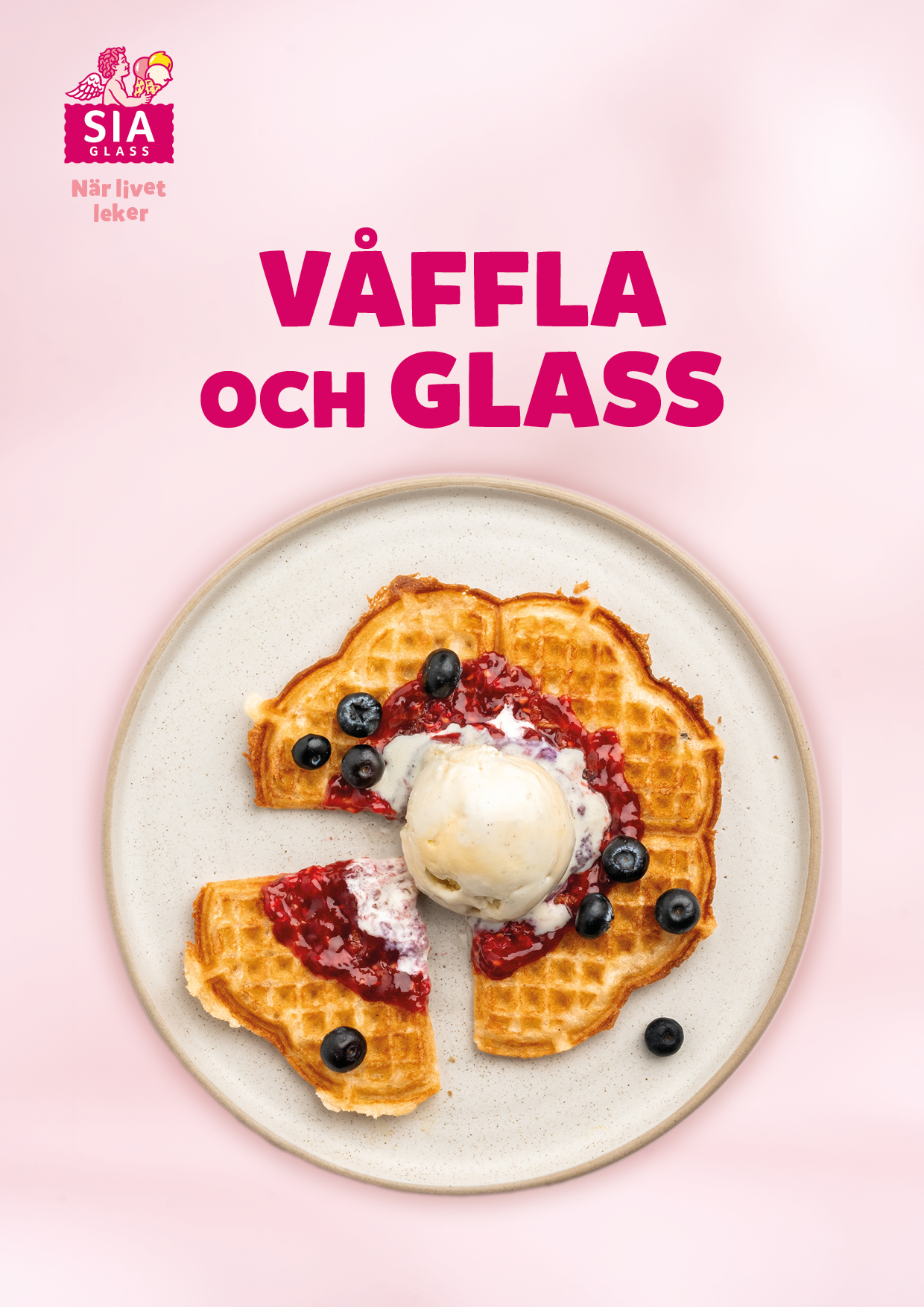 a plate of waffles with ice cream and berries