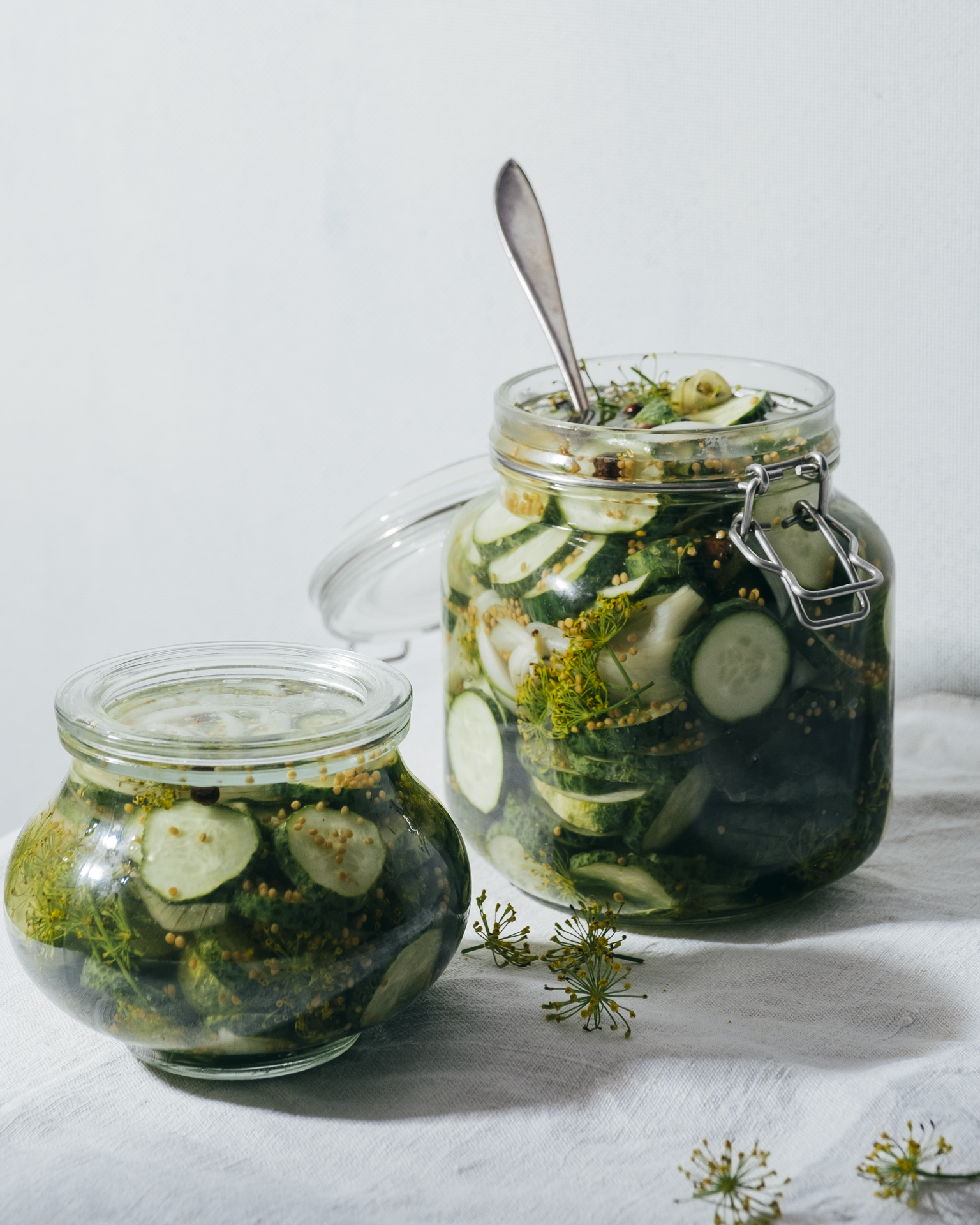 a jar of pickles and cucumbers
