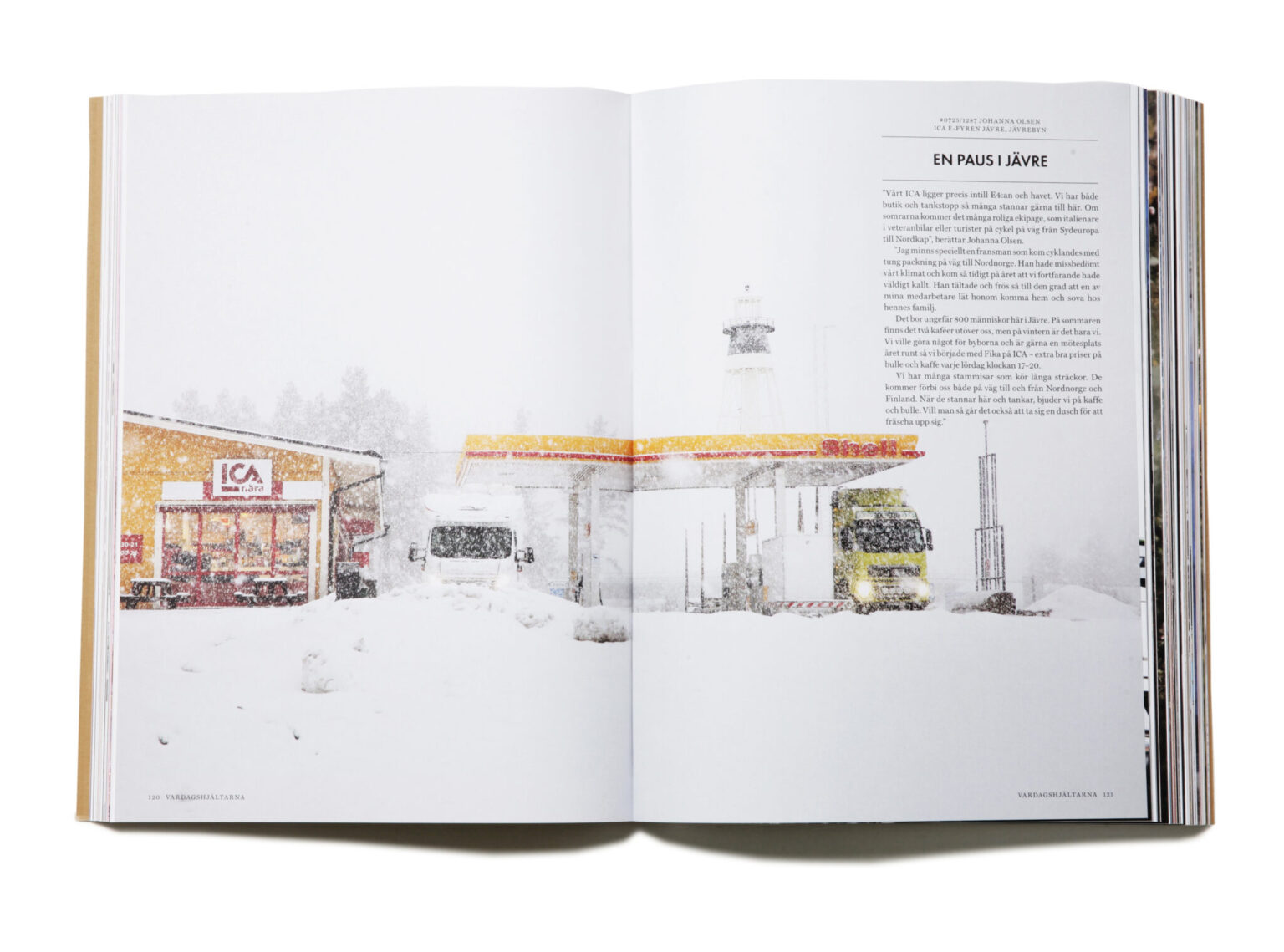 a book with a picture of a truck and a building in the snow
