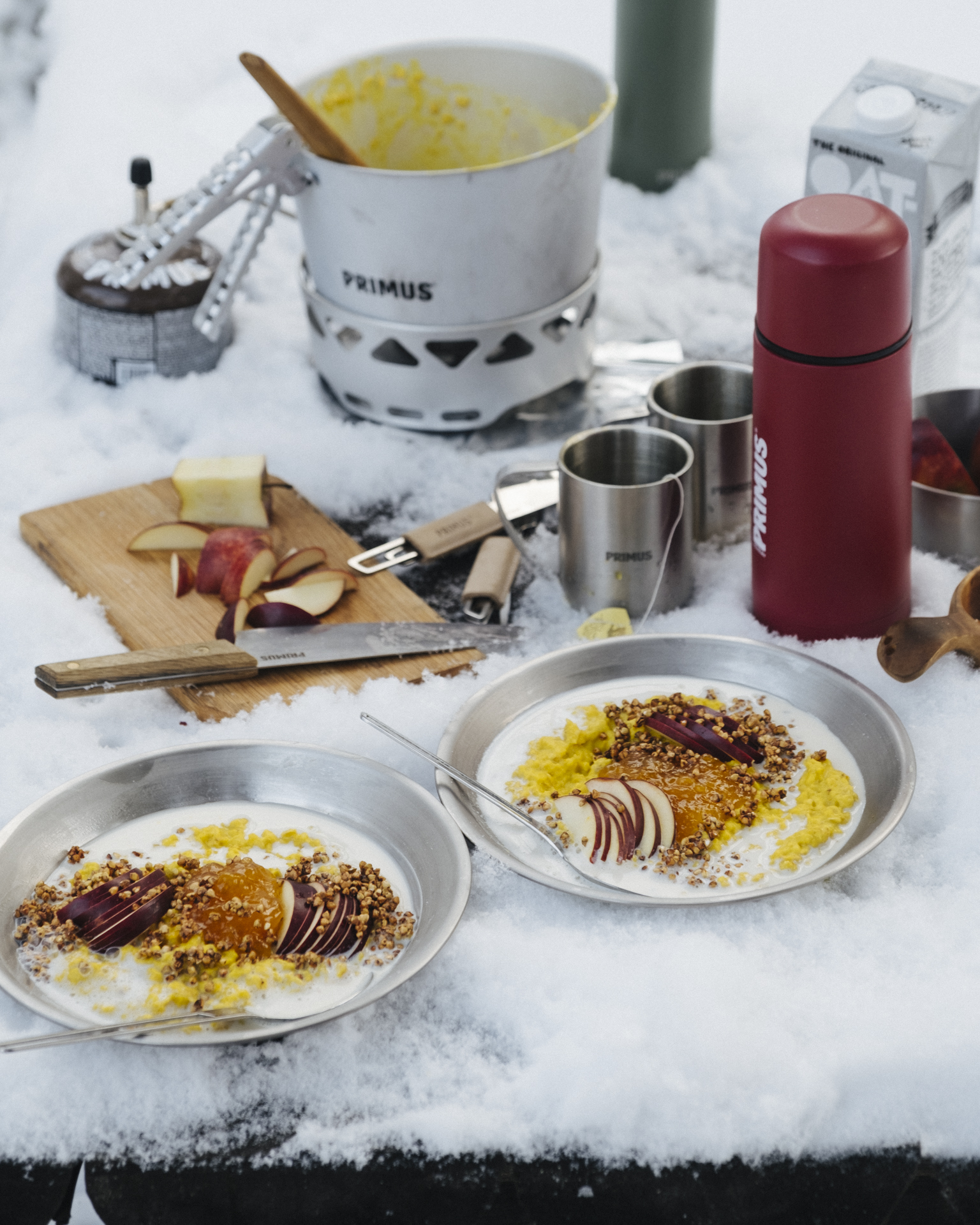 food in a bowl on snow