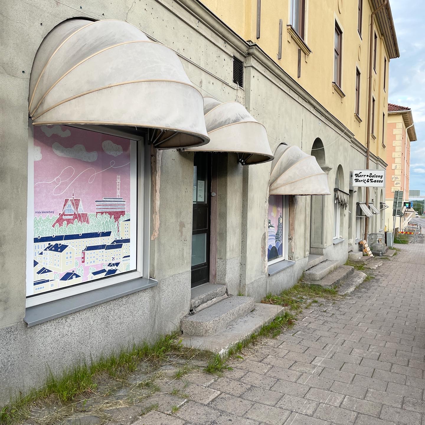 a building with awnings on the side