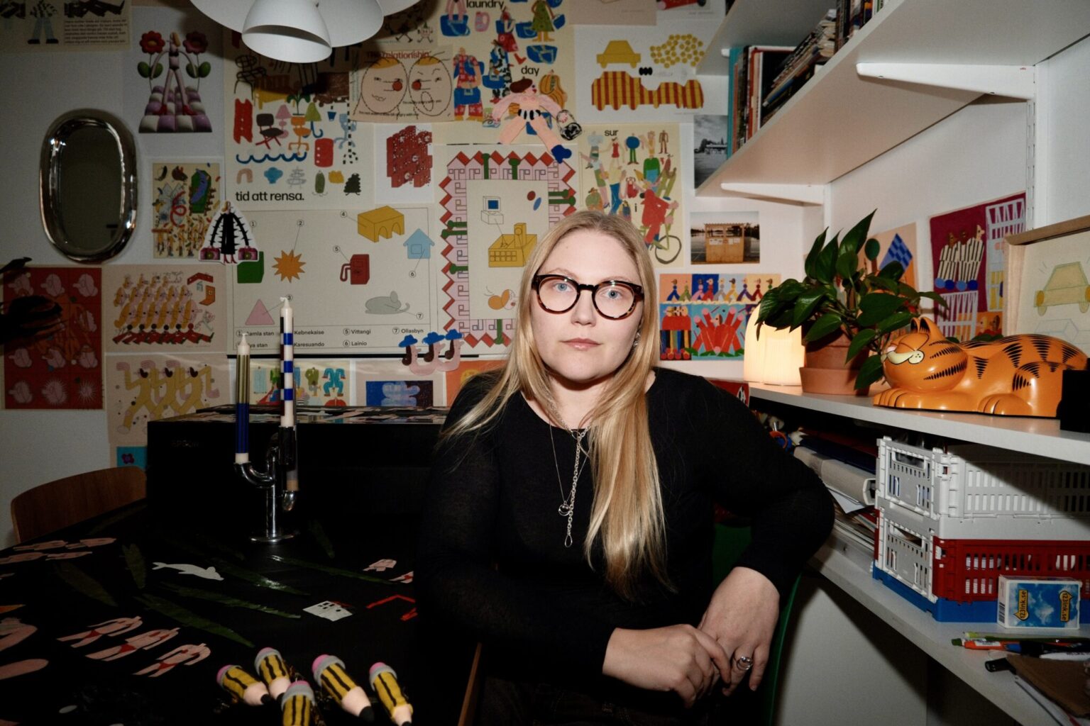 a woman sitting at a desk