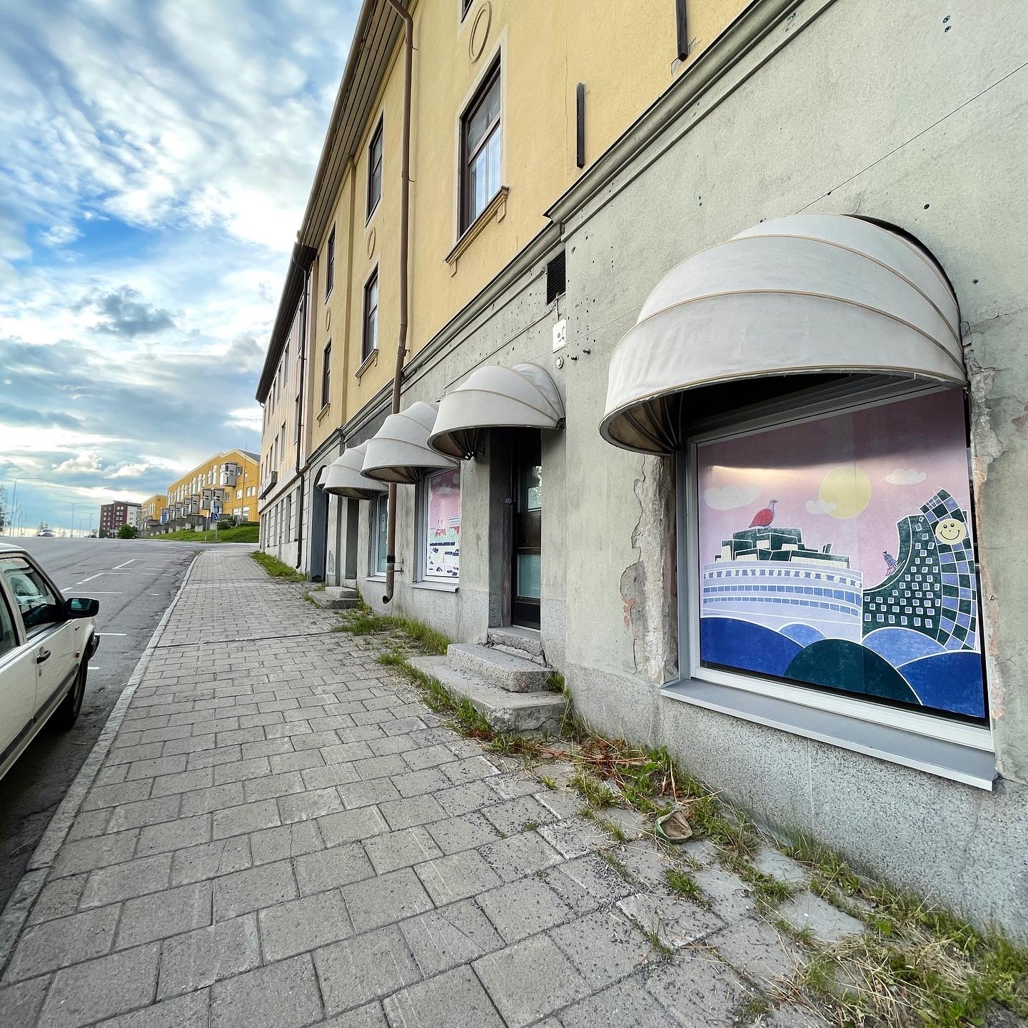a building with awnings on the side