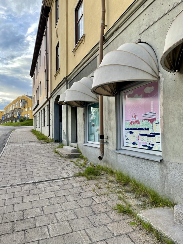 a building with awnings on the side