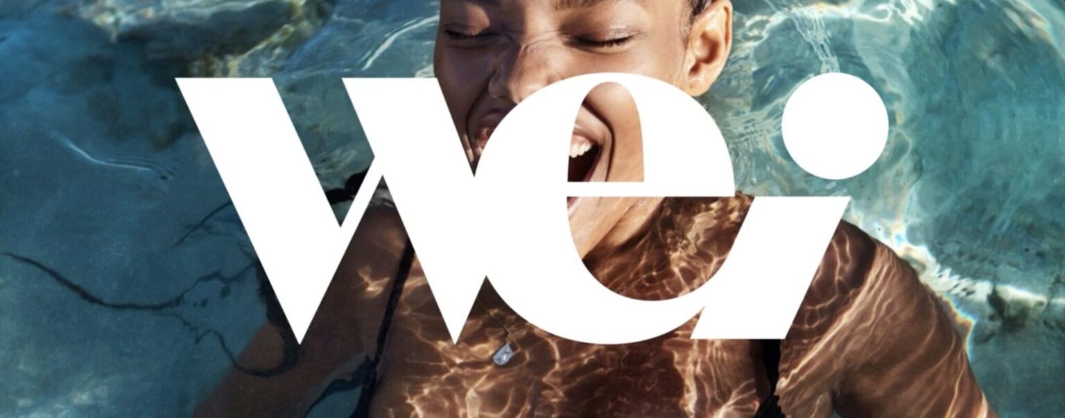 Woman in water with "wei" text overlay.